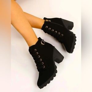 Woman lace up buckle black booties